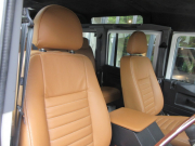 ランドローバー ディフェンダー 110SW 2.2Tdci 本革張替 新品SawtoothブラックAW 7人乗り Nox/Pm適合 3ナンバー 後期PUMAモデル ブラックパック 新品BFGタイヤ コンフォートスプリング LEDヘッドライト LEDレンズKIT ブラックチェッカープレート 前後マッドフラップ  サイドランナー 背面タイヤ 並行輸入車 右ハンドル 記録簿付の中古車