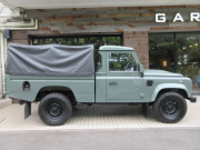 ランドローバー ディフェンダー 110SCPU 2.2Tdci ピックアップトラック Wolfstyleブラックホイール 2人乗り 後期PUMAモデル Nox/Pm適合 1ナンバー 新品エアコン装着 ヘリテイジスタイル CANVAS幌 クリアレンズ ヘリテイジグリル ウイングブラックチェッカープレート 前後マッドフラップ 並行輸入車 右ハンドル 記録簿付の中古車