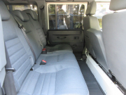 ランドローバー ディフェンダー 110 2.4TDCi SW 社外2DINナビTV Nox/PM適合 3ナンバー登録 ヘリテイジスタイル フォールディングサイドステップ ウッドステアリング 背面タイヤ 並行車 右ハンドル 記録簿付の中古車