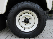 ランドローバー ディフェンダー 110 2.4TDCi SW 社外2DINナビTV Nox/PM適合 3ナンバー登録 ヘリテイジスタイル フォールディングサイドステップ ウッドステアリング 背面タイヤ 並行車 右ハンドル 記録簿付の中古車