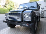 ランドローバー ディフェンダー 110SW 2.2Tdci XS 半革 純正AW 7人乗り Nox/Pm適合 3ナンバー AT換装済 クリアレンズ 前後マッドフラップ サイドランナー 背面タイヤ 並行輸入車 右ハンドル 記録簿付の中古車