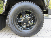 ランドローバー ディフェンダー 110SW 2.2Tdci XS 半革 ブラックBoostAW 7人乗り AT換装済 Nox/Pm適合 3ナンバー登録 アルカンターラルーフライニング チェッカープレート クリアレンズ 前後マッドフラップ サイドランナー 背面タイヤ 並行輸入車 右ハンドル 記録簿付の中古車