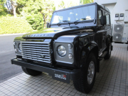 ランドローバー ディフェンダー 90SW 2.2Tdci XS 半革シート 純正AW 4人乗り AT換装済 Nox/Pm適合 3ナンバー登録 クリアレンズ サイドステップ 前後マッドフラップ 背面タイヤ 並行輸入車 右ハンドル 記録簿付の中古車