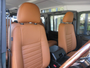 ランドローバー ディフェンダー 110SW 2.2Tdci本革張替 新品同色WolfStyleホイール ホワイトルーフ  ヘリテイジカスタム 7人乗り AT換装済 Nox/Pm適合 新品タイヤ 新品ヘリテイジグリル 新品ヘリテイジバッチ クリアレンズ 新品ウッドステアリング 背面タイヤ 並行輸入車 右ハンドル 記録簿付の中古車