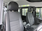 ランドローバー ディフェンダー 110SW 2.2Tdci XS 半革 SR 純正Boostホイール 7人乗り AT換装済 Nox/Pm適合 3ナンバー 稀少SR付 ステンレスボルト クリアレンズ 前後マッドフラップ XSサイドランナー リアNASステップ 背面タイヤ 並行輸入車 右ハンドル 記録簿付の中古車
