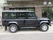 ランドローバー ディフェンダー 110SW 2.2Tdci XS 半革 SR 純正Boostホイール 7人乗り AT換装済 Nox/Pm適合 3ナンバー 稀少SR付 ステンレスボルト クリアレンズ 前後マッドフラップ XSサイドランナー リアNASステップ 背面タイヤ 並行輸入車 右ハンドル 記録簿付の中古車