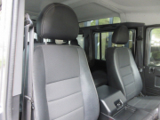 ランドローバー ディフェンダー 110SW 2.2Tdci XS 半革 Sawtoothブラックホイール 7人乗り AT換装済 Nox/Pm適合 3ナンバー ブラックパックペイント クリアレンズ 前後マッドフラップ XSサイドランナー 背面タイヤ 並行輸入車 右ハンドル 記録簿付の中古車