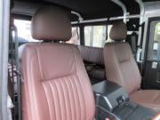ランドローバー ディフェンダー 110Softtop 2.2Tdci 本革張替 10人乗り ソフトトップカスタム ヘリテイジカスタム AT換装済 Nox/Pm適合 3ナンバー登録 ブラウン本革 ブラウンMohair生地幌 新品Wolfstyleスチールホイール 並行輸入車 右ハンドル 記録簿付の中古車