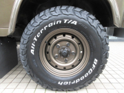 ランドローバー ディフェンダー 110Softtop 2.2Tdci 本革張替 ソフトトップカスタム ヘリテイジカスタム AT換装済 Nox/Pm適合 3ナンバー登録 ブラウン本革シート張替 ブラウンMohair生地幌 新品Wolfstyleスチールホイール同色ペイント ヘリテイジグリル ヘリテイジ白ロゴマッドフラップ フォールディングサイドステップ 並行輸入車 右ハンドル 記録簿付の中古車