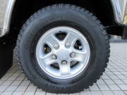 ランドローバー ディフェンダー 110SW 2.2Tdci XS 半革 純正Boostホイール 7人乗り AT換装済 Nox/Pm適合 3ナンバー モトリタステアリング クリアレンズ 前後マッドフラップ XSサイドランナー 背面タイヤ 並行輸入車 右ハンドル 記録簿付の中古車