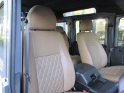 ランドローバー ディフェンダー 110SW 2.2Tdci XS 本革張替 デュアルフィニッシュAW 7人乗り AT換装済 Nox/Pm適合 3ナンバー アルカンターラルーフライニング フルカーペット施工 クルーズコントロール LEDヘッドライト クリアLEDレンズ 前後マッドフラップ XSサイドランナー 背面タイヤ  並行輸入車 右ハンドル 記録簿付の中古車