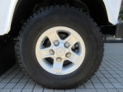ランドローバー ディフェンダー 110SW 2.4Tdci XS 半革 純正BoostAW 7人乗り AT換装済 Nox/Pm適合 3ナンバー フルカーペット施工 クリアレンズ  前後マッドフラップ XSサイドランナー 背面タイヤ 並行輸入車 右ハンドル 記録簿付の中古車